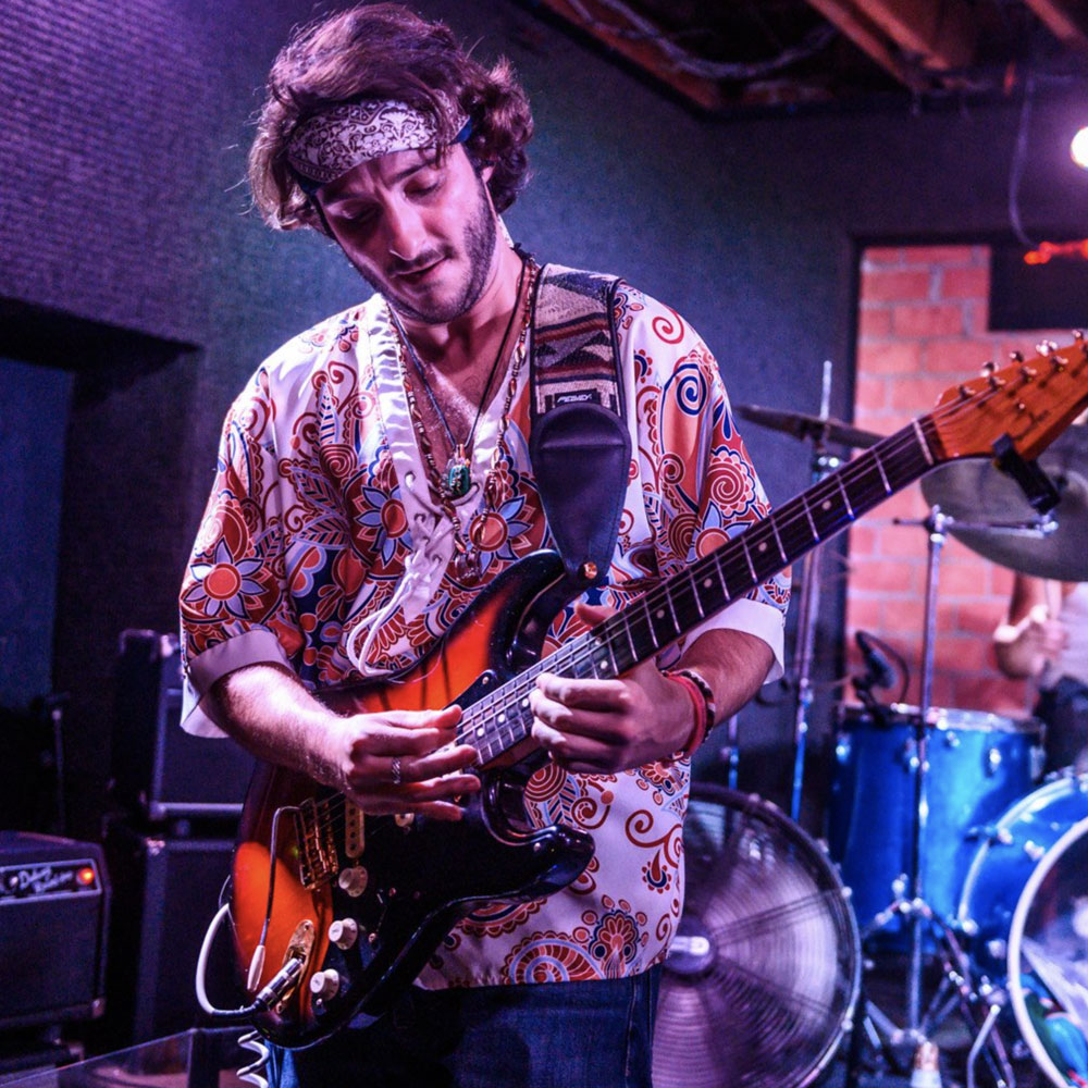 Cole Roussos, Guitar
